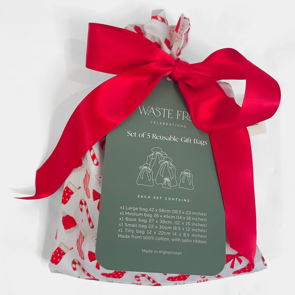 Set of 5 reusable gift bags. Traditional red and white design with christmas cookies and candy.