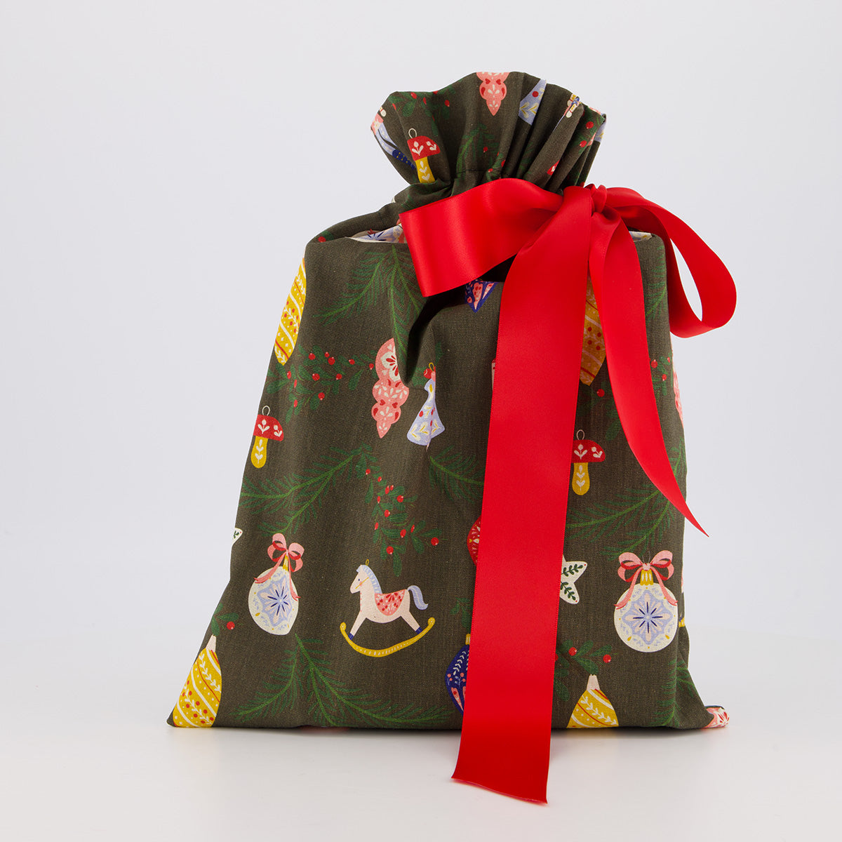 Book reusable gift bag — bold folk print in green, red and navy — handmade in Afghanistan