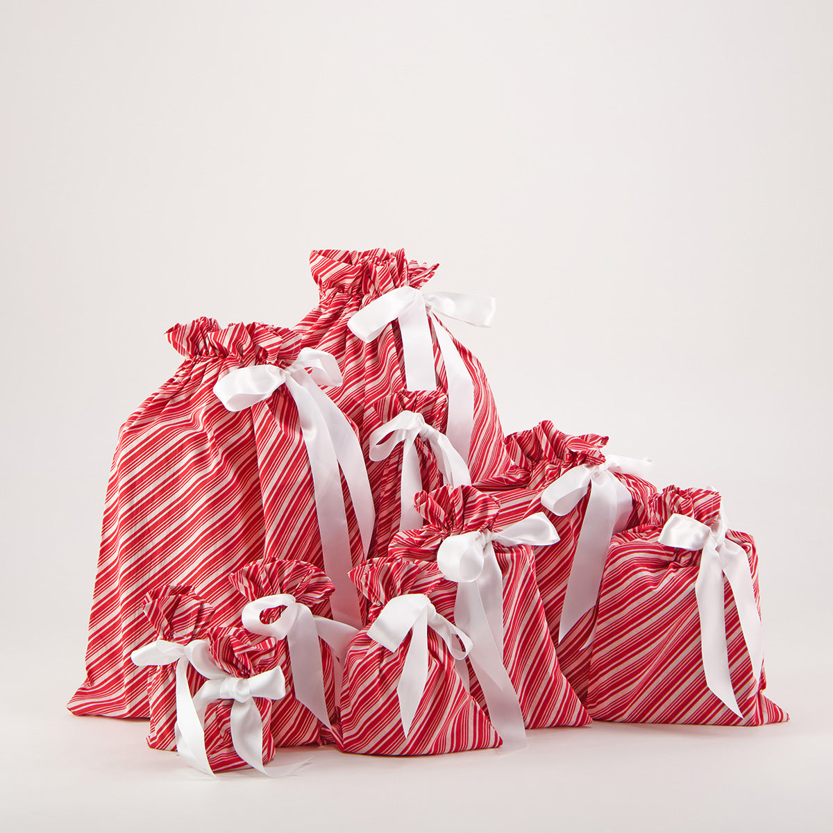 Candy Cane reusable gift bag set of 10 — classic red and white diagonal stripe — handmade in Afghanistan